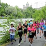 BERN, 12JUN16 - Keine nassen Fuesse: Lauf entlang der hoch fliessenden Aare auf der 10 km Strecke des 30. Schweizer Frauenlauf in Bern am 12. Juni 2016. Im Hintergrund das Bundeshaus.Impression of the 30th Swiss Women's Run in Bern, Switzerland, June 12, 2016. With more than 16,000 participants, the Swiss Women's Run is the largest women's sports event in Switzerland.swiss-image.ch/Photo Andy Mettler