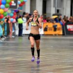BERN, 12JUN16 - Gluecklich ueber die vollbrachte Leistung: Eine Laeuferin bei der Zielankunft im Regen anlaesslich des 30. Schweizer Frauenlauf in Bern am 12. Juni 2016.Impression of the 30th Swiss Women's Run in Bern, Switzerland, June 12, 2016. With more than 16,000 participants, the Swiss Women's Run is the largest women's sports event in Switzerland.swiss-image.ch/Photo Michael Buholzer